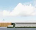 elongated, horizontal body of the house on the side of the street