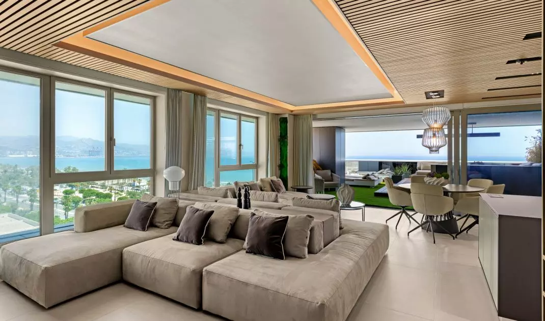 A two-section sofa helps organize the living room layout and allows you to use the space in several ways 