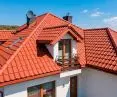 The solid structure of the roof tiles absorbs some of the energy from sound waves, limiting their transmission into the rooms