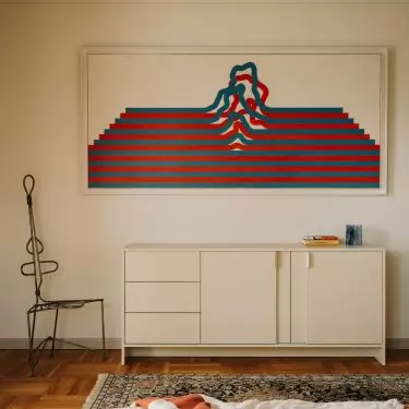 Wrocławski apartament projektu Buduar łączy sztukę, meble vintage i ciepłe, wyraziste kolory