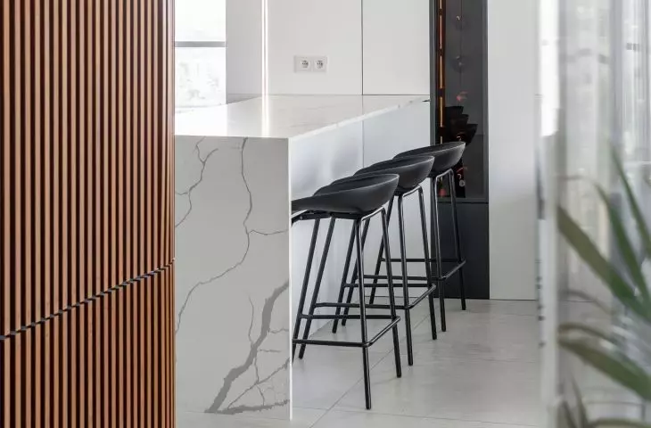 An apartment with a palm house in Warsaw, designed by AMJ Studio