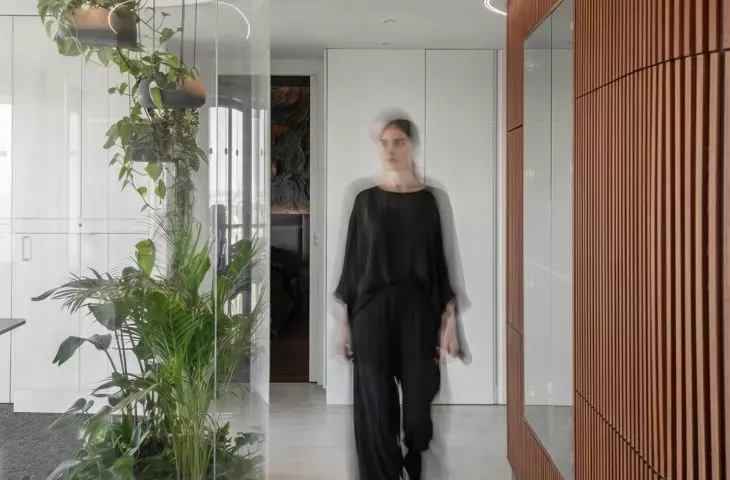 The palm house and the wooden structures are the most striking features of the interior
