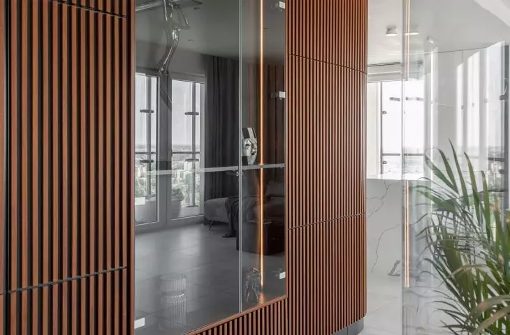 An apartment with a palm house in Warsaw, designed by AMJ Studio