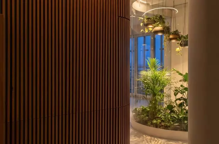 An apartment with a palm house in Warsaw, designed by AMJ Studio