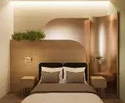 strefa sypialniana w pokoju hotelowym