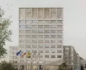 The facade, which is massive at the bottom, gradually becomes visually lighter