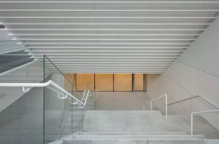 Stairs and landings lead through the building's various floors