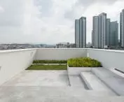 The rooftop terrace at Hapjeong Artplex offers a view of Seoul's cityscape
