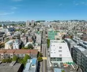 The building is situated within the densely built-up area of the Hapjeong-dong neighborhood
