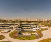 Green terraces and courtyards were created within the former shopping center