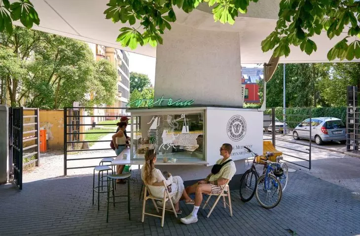 The café is located in the passageway between the two universities