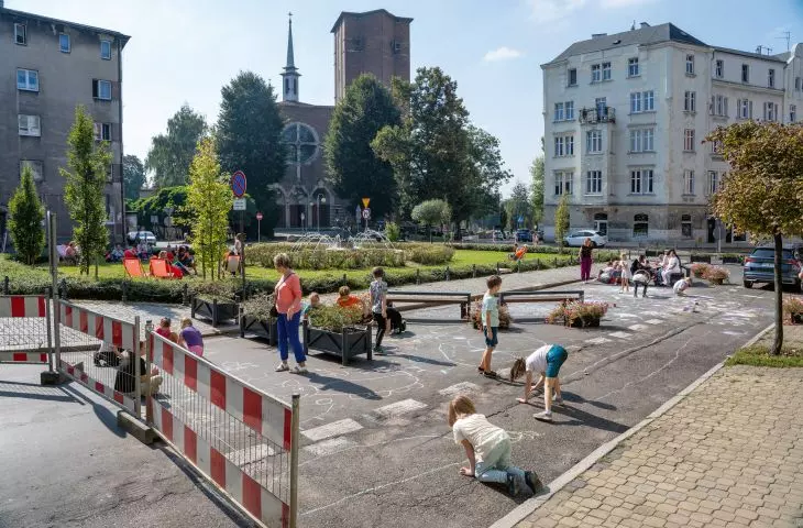 children playing near Matejko Square in Chorzów, in a place usually dominated by cars