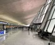 Check-in and baggage drop-off area in the main terminal at Washington Dulles International Airport