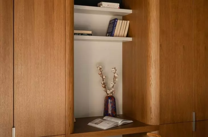 A small workspace has been set aside among the wooden buildings