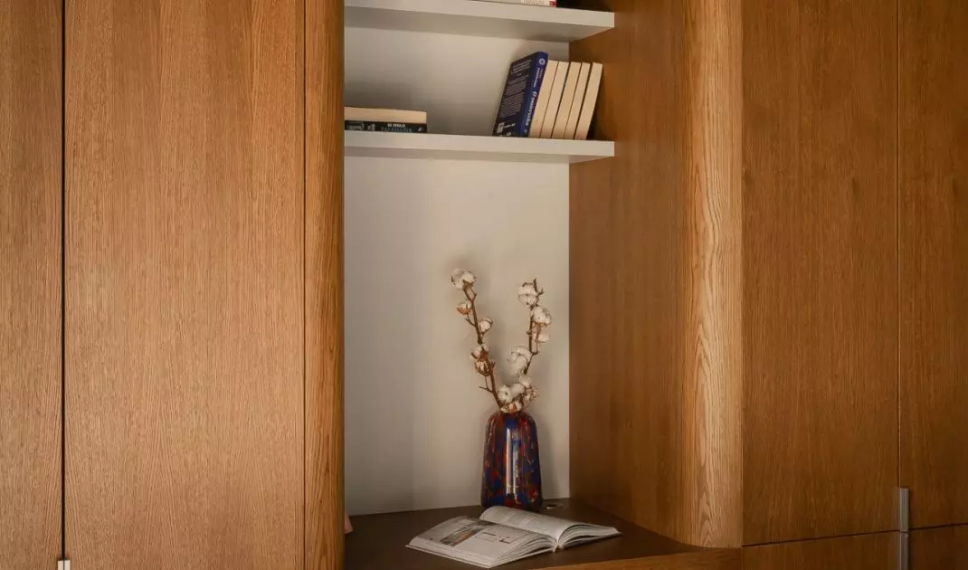A small workspace has been set aside among the wooden buildings