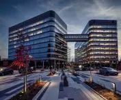 The Fabryczna Office Park office, hotel, and conference complex, built on the site of the former “Polmos” distillery in Kraków, designed by IMB Asymetria / INTER-BUD Group; Construction period: 2019–2026