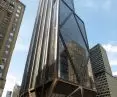 A series of offsets and diagonal structural elements divide the 423-meter tower into distinct sections