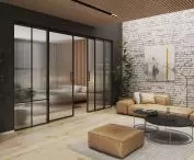 Living room with a suspended ceiling system and LUMI panels