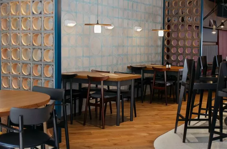 The geometric pattern of a circle inscribed in a square is repeated in many places 