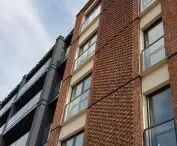 Careful ceramic finishing of the facade of an apartment building on Chwaliszewo Street, 2020, proj.: CDF Architects