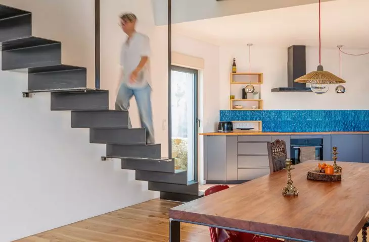In the evenings, the kitchen-dining room becomes the heart of the home in Ulgueir