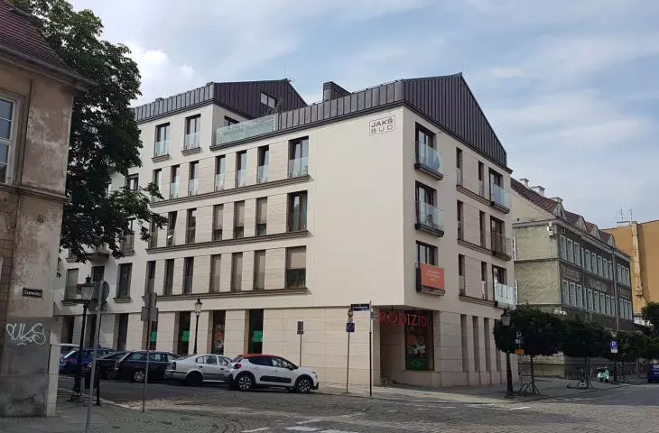 merely correct form of development additions on Dominikanska Street stands out from its surroundings in quality and character