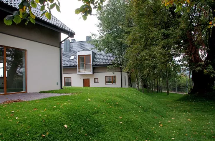The buildings are surrounded by lots of greenery