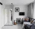 Part of the bedroom and living room