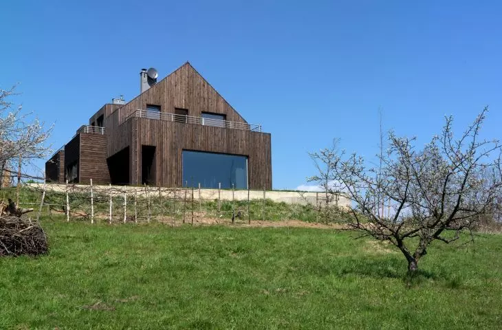 A panoramic window is located in the living room