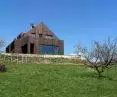 A panoramic window is located in the living room