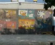 A mosaic designed by Domicella Bożekowska on the facade of the production building of the former Saturn Disabled Cooperative.