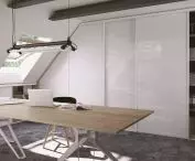 Sliding doors in a room with bevels