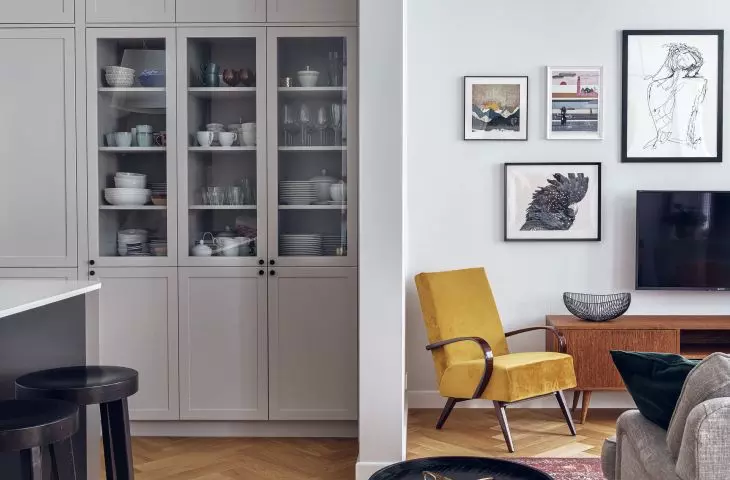 Between the living room and the kitchen