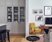 Between the living room and the kitchen