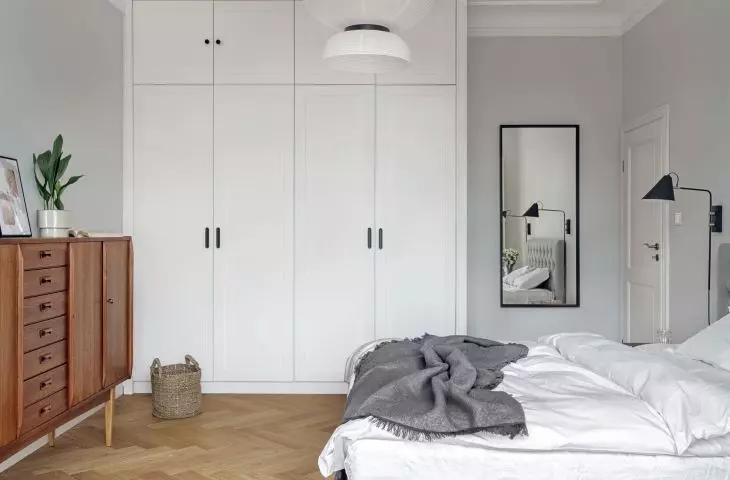 Bedroom maintained in light color tones