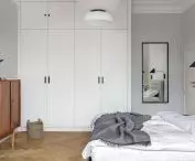 Bedroom maintained in light color tones