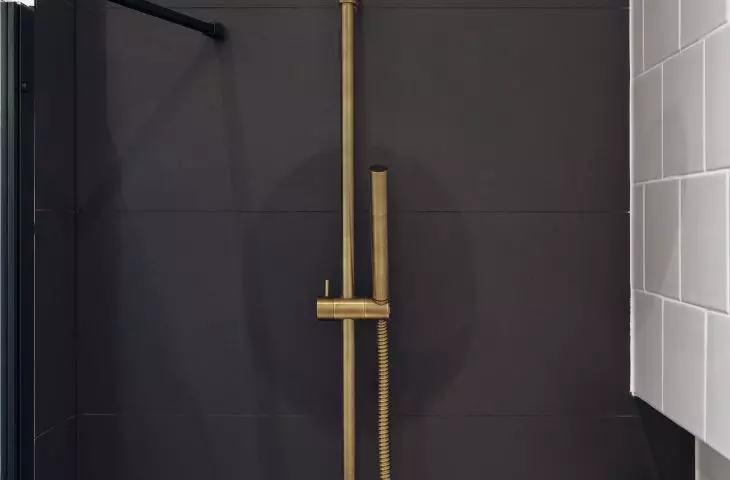 Gold and black bathroom