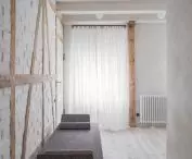 A chaise longue in the hallway