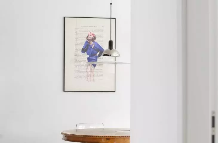A wooden table completes the interior
