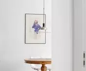 A wooden table completes the interior
