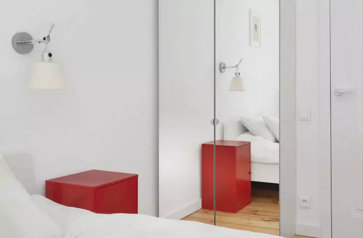 Bedroom with an element of cotrasting red