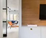 Wall covered with wood in the TV room