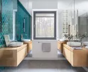 Bathroom with dark turquoise accents 