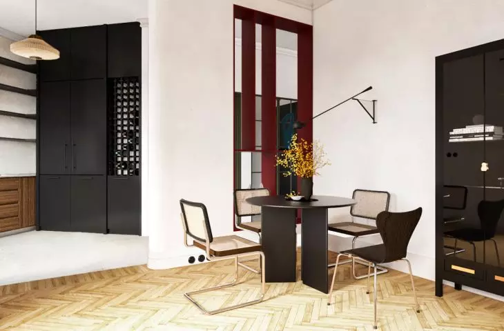 The living room intermingles with the kitchen