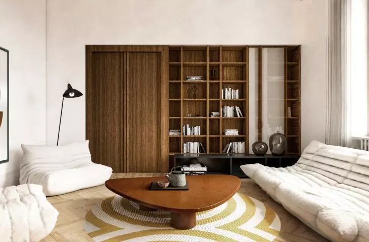 Behind the door in the living room is the bedroom