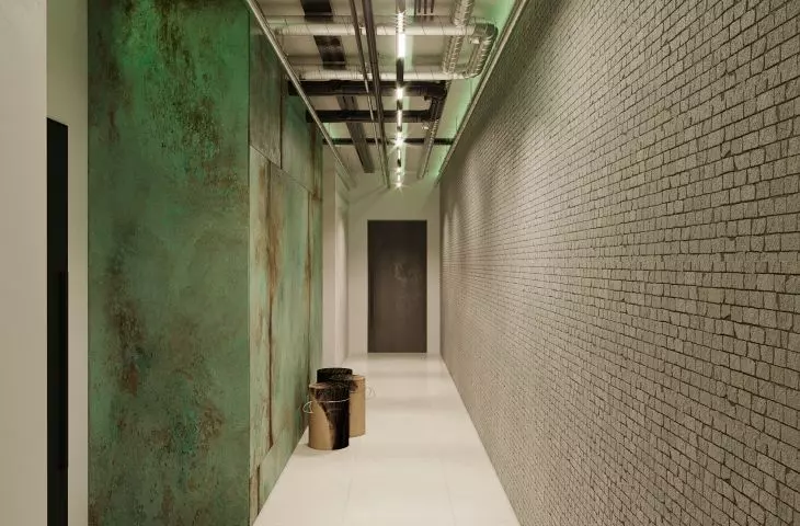 A corridor leading to each apartment