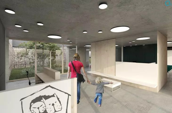 The central front pavilion contains the entrance area with waiting room, secretariat, adoption room and education room