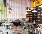 The colors of the chairs correspond with the colors of the walls