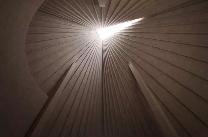 Light enters through an opening in the roof