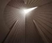 Light enters through an opening in the roof